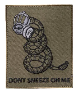 Varusteleka Don't Sneeze on Me moraalimerkki